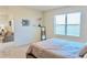 Bedroom with calm decor, a serene view, and plush carpets at 156 Eagleview Loop, Davenport, FL 33837
