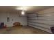 A clean two-car garage offers secure parking, storage space, and interior access to the home at 156 Eagleview Loop, Davenport, FL 33837