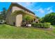Spacious backyard featuring a well-maintained lawn and outdoor seating area at 1563 Song Sparrow Ct, Sanford, FL 32773