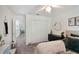Spacious bedroom featuring a cozy bed, ample closet space, and a neutral color scheme at 1563 Song Sparrow Ct, Sanford, FL 32773