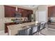 Updated kitchen with granite counters, stainless appliances and breakfast bar for additional seating at 1563 Song Sparrow Ct, Sanford, FL 32773