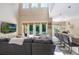 Bright and open living room with a modern design, perfect for entertaining guests at 1563 Song Sparrow Ct, Sanford, FL 32773