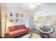 Bright living room features a cozy couch, stylish decor, and an airy, open layout at 1563 Song Sparrow Ct, Sanford, FL 32773