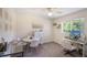 Bright office space featuring a round table, a sleek desk, and contemporary decor at 1563 Song Sparrow Ct, Sanford, FL 32773