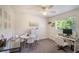 Bright office space featuring a round table, a sleek desk, and contemporary decor at 1563 Song Sparrow Ct, Sanford, FL 32773
