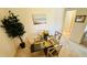 A dining room with a glass table, gray chairs, and light-colored walls at 1600 W Lake Parker Dr # C24, Lakeland, FL 33805