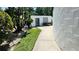 Charming exterior of building with vibrant greenery at 1600 W Lake Parker Dr # C24, Lakeland, FL 33805
