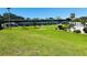 Spacious grassy area in front of the building for outdoor activities at 1600 W Lake Parker Dr # C24, Lakeland, FL 33805