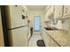 An open kitchen with stainless steel sink and laminate countertops at 1600 W Lake Parker Dr # C24, Lakeland, FL 33805