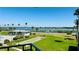 Enjoy this beautiful view of the lake, lush green lawns and palm trees from this property at 1600 W Lake Parker Dr # C24, Lakeland, FL 33805