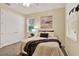 Comfortable bedroom with a cozy bed, stylish bedding, and abundant natural light from the windows at 1626 Victoria Gardens Drive, Deland, FL 32724