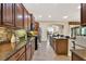 Beautiful kitchen featuring granite countertops, stainless steel appliances, and ample cabinet space at 1626 Victoria Gardens Drive, Deland, FL 32724
