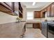 Functional laundry room with ample counter space, cabinets, and a modern washer and dryer at 1626 Victoria Gardens Drive, Deland, FL 32724
