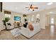 Open-concept living room features lots of light, high ceilings and views to other areas of home at 1626 Victoria Gardens Drive, Deland, FL 32724