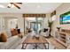 Inviting living room with tile floors and comfortable seating is perfect for relaxing and entertaining at 1626 Victoria Gardens Drive, Deland, FL 32724