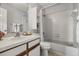 Full bathroom with a shower over tub, vanity, and shelving at 1631 Long Ridge Ct # 268, Orlando, FL 32807