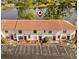 Inviting townhouse near the lake featuring a red-tiled roof and reserved parking spaces at 1631 Long Ridge Ct # 268, Orlando, FL 32807