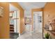 Bright, airy home with tile floors, open floor plan, and a view of the laundry room and living room at 1631 Long Ridge Ct # 268, Orlando, FL 32807