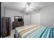 Comfortable bedroom with a ceiling fan and closet at 1632 Lansfield Ave, Deltona, FL 32738