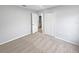 Neutral bedroom showcases carpet, a closet, and a doorway leading to the bathroom, maximizing comfort and convenience at 1730 Lochshyre Loop, Ocoee, FL 34761