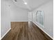 Spacious living room with wood floors and natural light at 1730 Lochshyre Loop, Ocoee, FL 34761