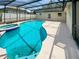 Enclosed, in-ground pool with attached hot tub at 1730 Lochshyre Loop, Ocoee, FL 34761