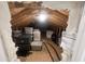Unfinished attic space showing exposed rafters and packed storage boxes and containers at 18907 Rawson St, Orlando, FL 32827