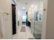 Bright bathroom featuring glass shower, bedroom access, and vanity at 18907 Rawson St, Orlando, FL 32827
