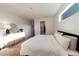 Bright bedroom with modern furniture and a view to a walk-in closet at 18907 Rawson St, Orlando, FL 32827