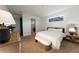 Bedroom with modern design elements and a view of the en suite bathroom at 18907 Rawson St, Orlando, FL 32827