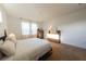 Bright bedroom featuring a comfortable bed and ample natural light at 18907 Rawson St, Orlando, FL 32827