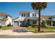 Beautiful two-story home with a two-car garage, well-maintained lawn, and a welcoming covered front porch at 18907 Rawson St, Orlando, FL 32827