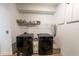 Clean and organized laundry room with modern washer and dryer at 18907 Rawson St, Orlando, FL 32827
