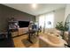 Well-appointed home office with modern decor, ample storage, and comfortable seating at 18907 Rawson St, Orlando, FL 32827