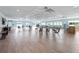 Large community room with ample seating and natural light, ideal for social gatherings at 2 Oceans West Blvd # 2006, Daytona Beach Shores, FL 32118