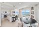 Open concept dining and kitchen area with views of the ocean at 2 Oceans West Blvd # 2006, Daytona Beach Shores, FL 32118