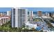 Stunning high-rise condo building featuring a pool, parking, and panoramic ocean views at 2 Oceans West Blvd # 2006, Daytona Beach Shores, FL 32118