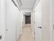 Hallway leading to bathroom with soaking tub at 2 Oceans West Blvd # 2006, Daytona Beach Shores, FL 32118