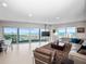 Open living room offering plenty of natural light, modern décor, and breathtaking ocean views at 2 Oceans West Blvd # 2006, Daytona Beach Shores, FL 32118