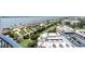 Scenic waterfront view of the intercoastal waterway with buildings, docks, and fairways at 2 Oceans West Blvd # 2006, Daytona Beach Shores, FL 32118