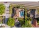 Aerial view of a home with a screened pool, manicured yard, and close proximity to nearby homes at 201 Twelve League Cir, Casselberry, FL 32707