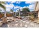 A backyard pool featuring a screened enclosure, patio area, and landscaped surroundings at 201 Twelve League Cir, Casselberry, FL 32707