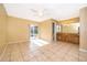 Bedroom view with a wooden vanity and access to an en-suite bathroom, and sliding door access to the pool at 201 Twelve League Cir, Casselberry, FL 32707