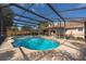 Large screened-in pool and patio area ideal for entertaining, with a spa and an outdoor bar at 201 Twelve League Cir, Casselberry, FL 32707