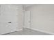 Bright bedroom features a large closet with paneled double doors and modern, dark hardware at 20446 Quinlan St, Orlando, FL 32833