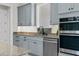 Close up on modern kitchen design with stainless steel appliances and granite countertops at 20446 Quinlan St, Orlando, FL 32833