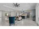 Open-concept living space with modern furnishings and a view into the kitchen at 20446 Quinlan St, Orlando, FL 32833