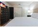 This bedroom features a large comfortable bed, a TV, and a spacious closet for ample storage at 2123 Lelani Cir, Davenport, FL 33897