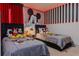 Inviting ' bedroom featuring themed decor, comfortable beds, and playful design elements at 2123 Lelani Cir, Davenport, FL 33897