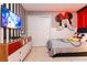 Decorated themed bedroom featuring fun decorations, comfortable beds, and playful design elements at 2123 Lelani Cir, Davenport, FL 33897